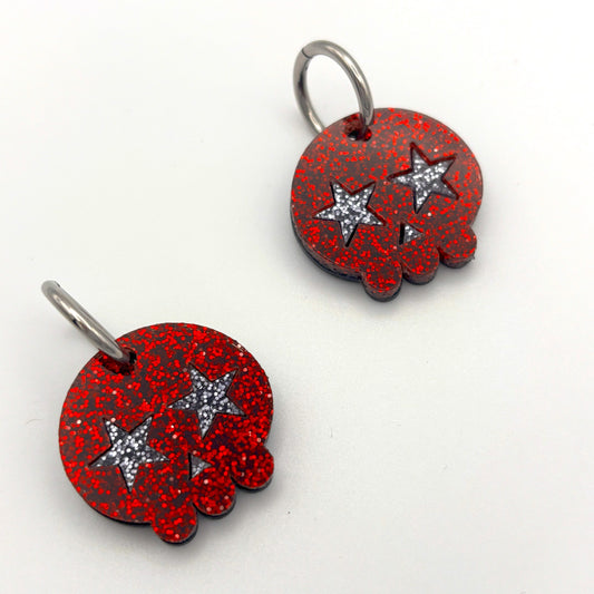 Pendientes de Calavera Kawai purpurina rojo