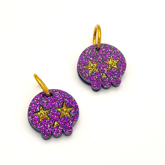 Pendientes de Calavera Kawai purpurina morado